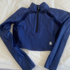 Good American cropped blue zip up
